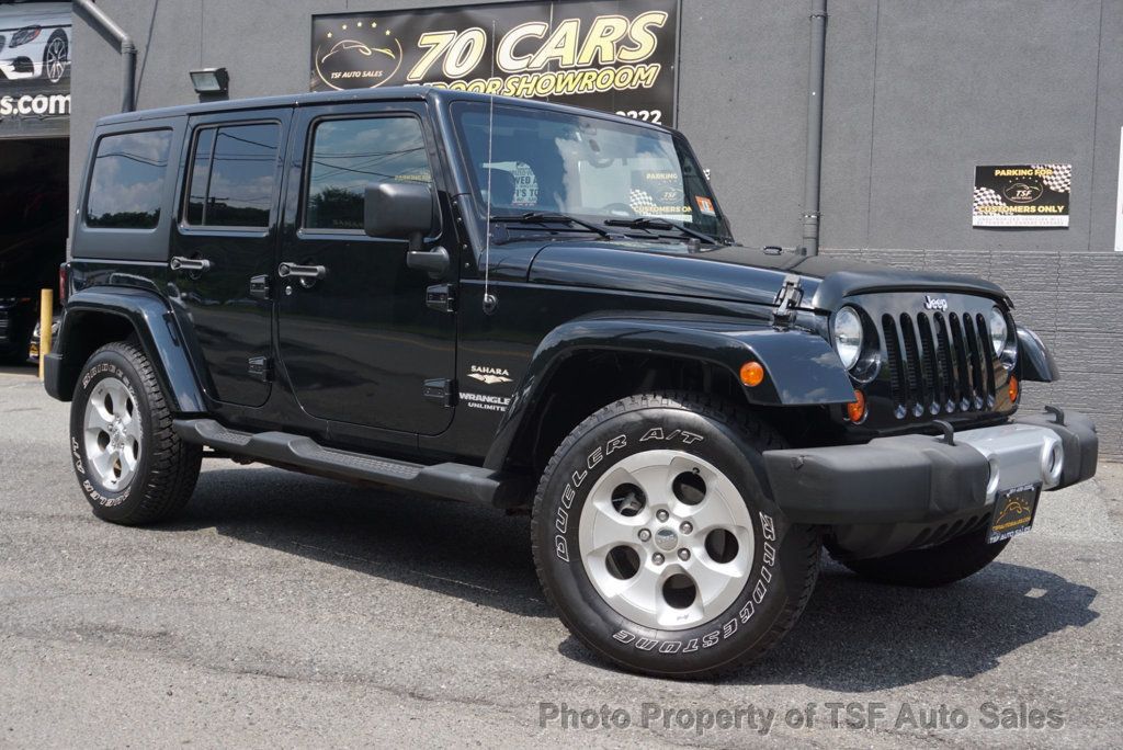 2013 Jeep Wrangler Unlimited 4WD 4dr Sahara - 22539211 - 0