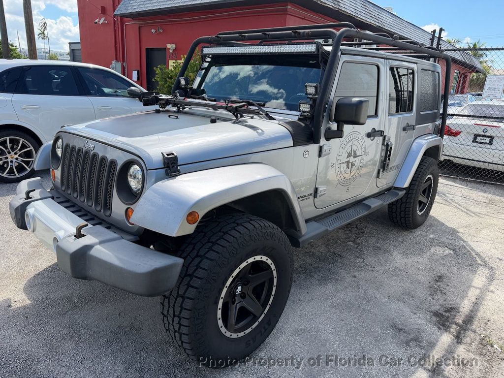 2013 Jeep Wrangler Unlimited 4WD Sahara - 23087828 - 0