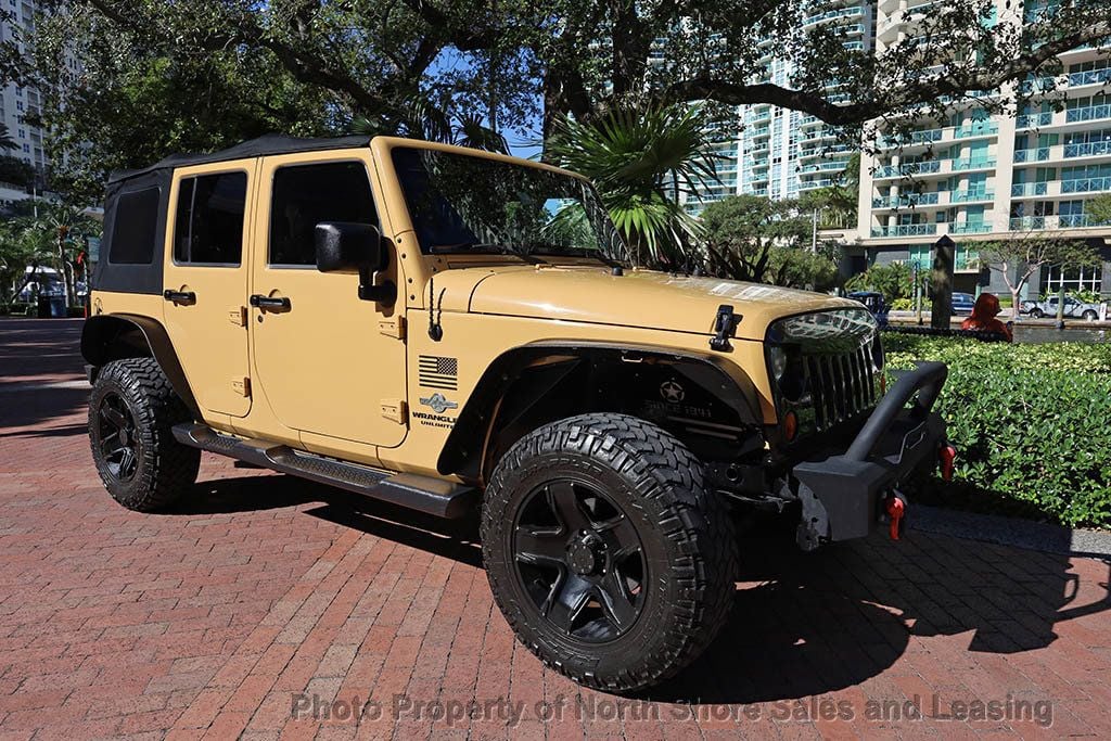 2013 Jeep Wrangler Unlimited 4WD Sport S - 22695091 - 0