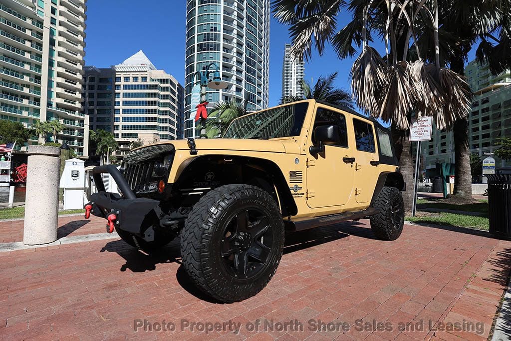 2013 Jeep Wrangler Unlimited 4WD Sport S - 22695091 - 25