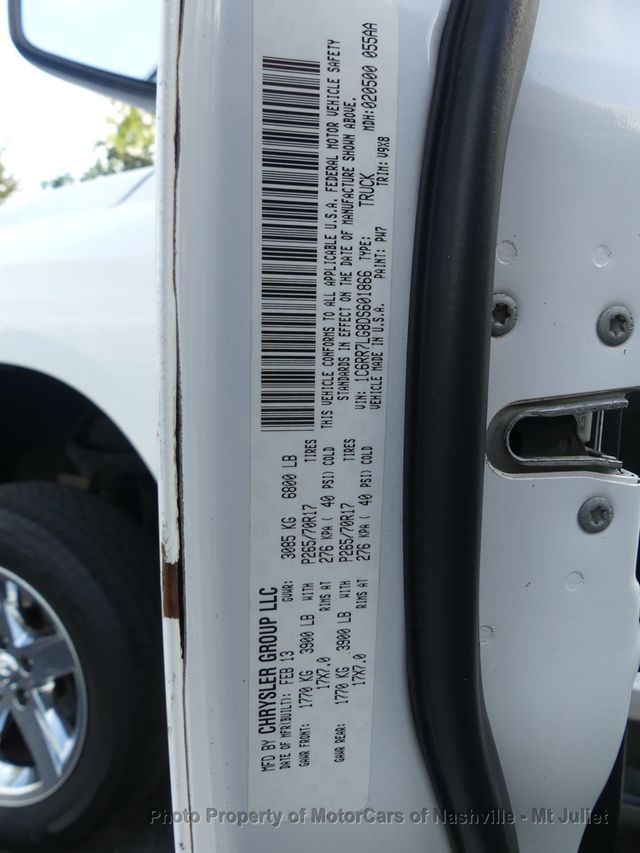 2013 Ram 1500 4WD Crew Cab 140.5" SLT - 23085607 - 38
