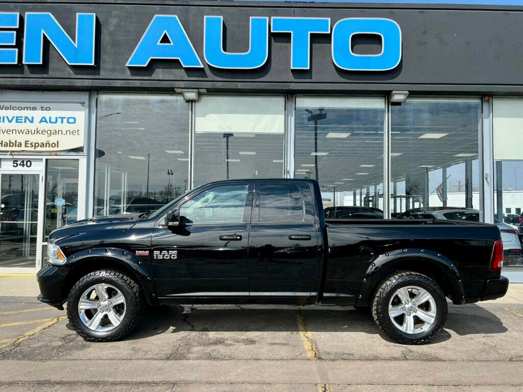 2013 Ram 1500 4WD Quad Cab 140.5" Sport - 22950216 - 31