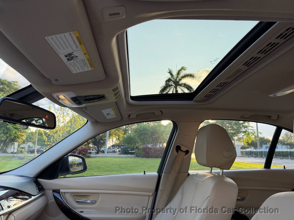 2014 BMW 3 Series 320i Sedan - 23021248 - 22