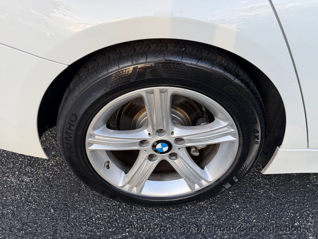 2014 BMW 3 Series 320i Sedan - 23021248 - 32