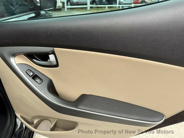 2014 Hyundai Elantra 4dr Limited. Light tick. Warranty - 23004938 - 14