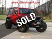 2014 Jeep Wrangler 4WD 2dr Willys Wheeler - 22811947 - 0