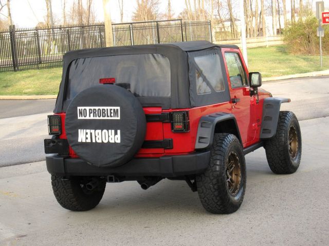 2014 Jeep Wrangler 4WD 2dr Willys Wheeler - 22811947 - 13