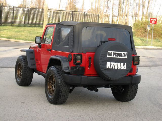 2014 Jeep Wrangler 4WD 2dr Willys Wheeler - 22811947 - 14