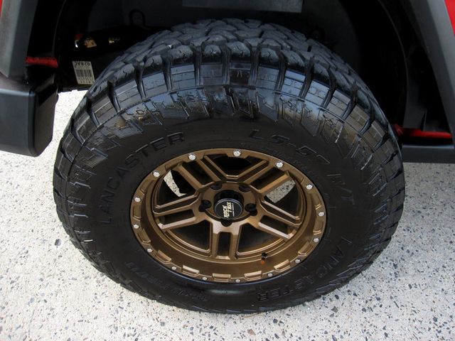 2014 Jeep Wrangler 4WD 2dr Willys Wheeler - 22811947 - 32