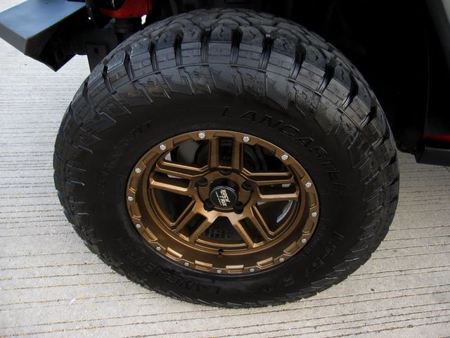 2014 Jeep Wrangler 4WD 2dr Willys Wheeler - 22811947 - 34