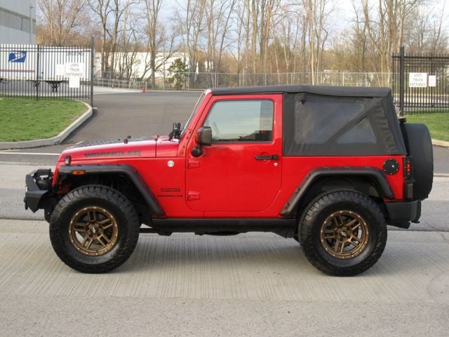 2014 Jeep Wrangler 4WD 2dr Willys Wheeler - 22811947 - 7