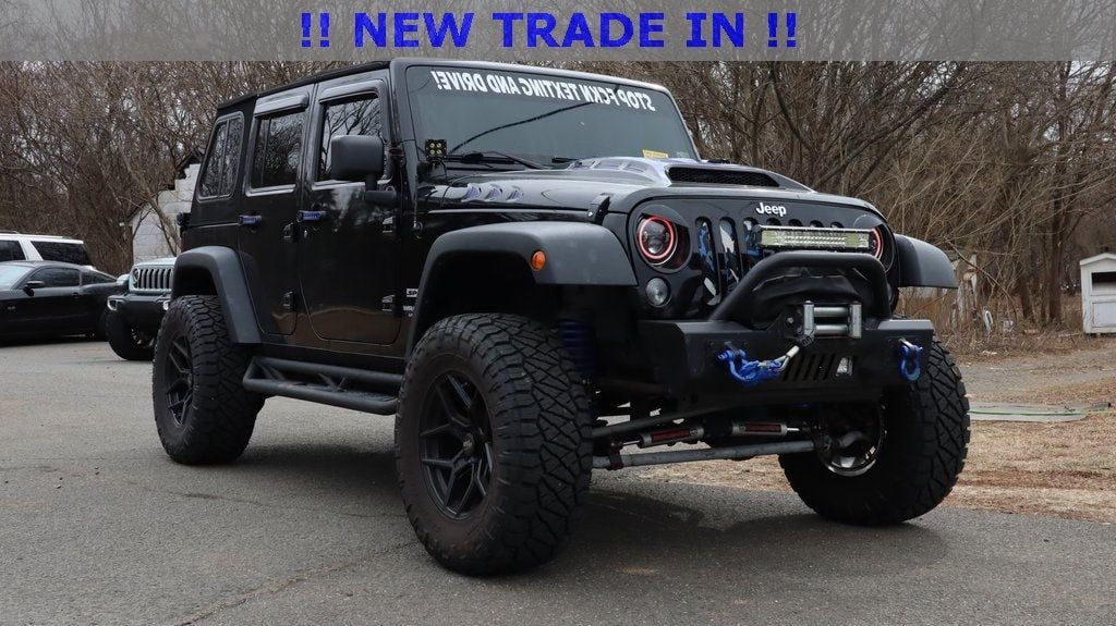 2014 Jeep Wrangler Unlimited Sport - 22781186 - 0