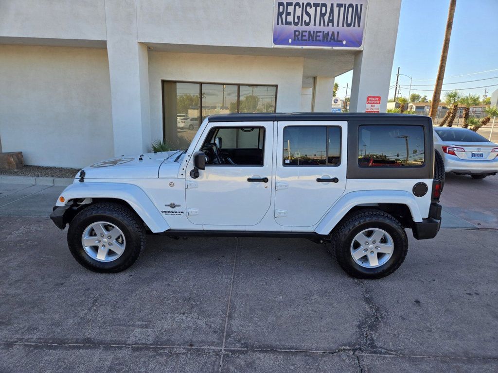 2014 Jeep Wrangler Unlimited 4WD 4dr Sport Freedom Edition - 22940643 - 1