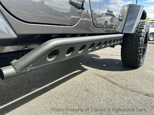 2014 Jeep Wrangler Unlimited Sahara Edition - 23068387 - 24
