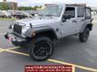 2014 Jeep Wrangler Unlimited Sport 4x4 4dr SUV - 22474510 - 0