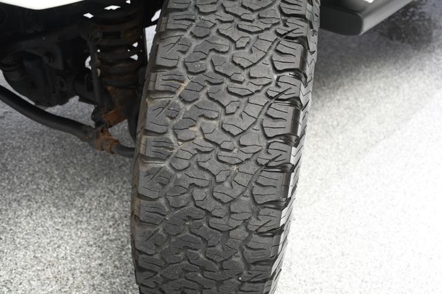 2014 Jeep Wrangler Unlimited Unlimited Sahara Hartop Leather Lift kit - 23049249 - 63
