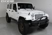 2014 Jeep Wrangler Unlimited Unlimited Sahara Hartop Leather Lift kit custom wheels - 23049249 - 0