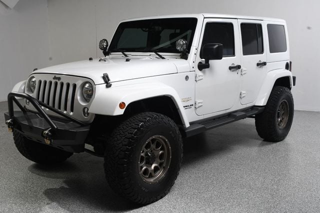 2014 Jeep Wrangler Unlimited Unlimited Sahara Hartop Leather Lift kit custom wheels - 23049249 - 1