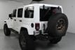 2014 Jeep Wrangler Unlimited Unlimited Sahara Hartop Leather Lift kit custom wheels - 23049249 - 4
