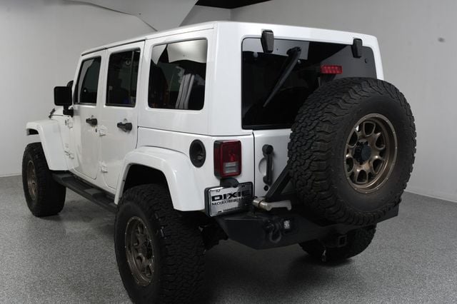 2014 Jeep Wrangler Unlimited Unlimited Sahara Hartop Leather Lift kit custom wheels - 23049249 - 4
