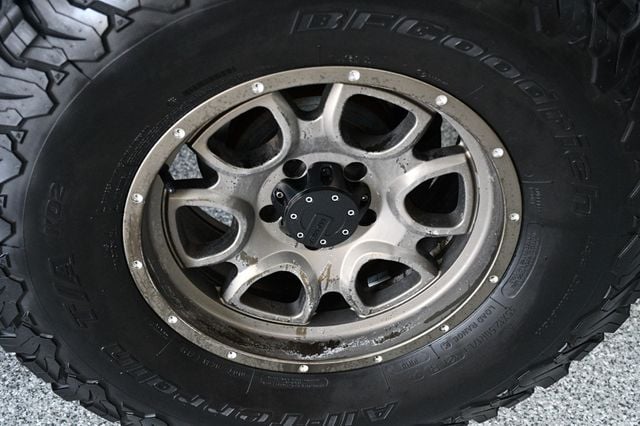 2014 Jeep Wrangler Unlimited Unlimited Sahara Hartop Leather Lift kit custom wheels - 23049249 - 53