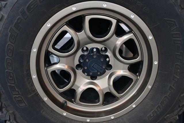 2014 Jeep Wrangler Unlimited Unlimited Sahara Hartop Leather Lift kit custom wheels - 23049249 - 55