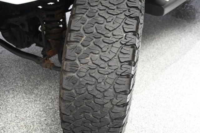 2014 Jeep Wrangler Unlimited Unlimited Sahara Hartop Leather Lift kit custom wheels - 23049249 - 56