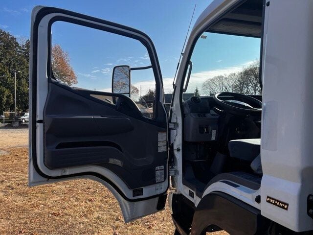 2014 Mitsubishi FUSO 4X4 STAKE BODY 13 FOOT  WITH SLIDING VINYL TOP  ONLY 6,000 MILES - 22588640 - 16