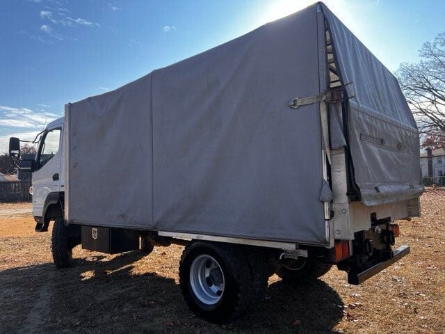 2014 Mitsubishi FUSO 4X4 STAKE BODY 13 FOOT  WITH SLIDING VINYL TOP  ONLY 6,000 MILES - 22588640 - 6