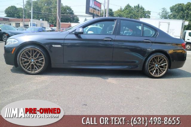 2015 BMW 5 Series 550i xDrive - 22557211 - 4