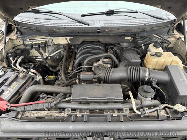 2015 Ford F-150 4WD SuperCrew 145" XLT - 22990915 - 24