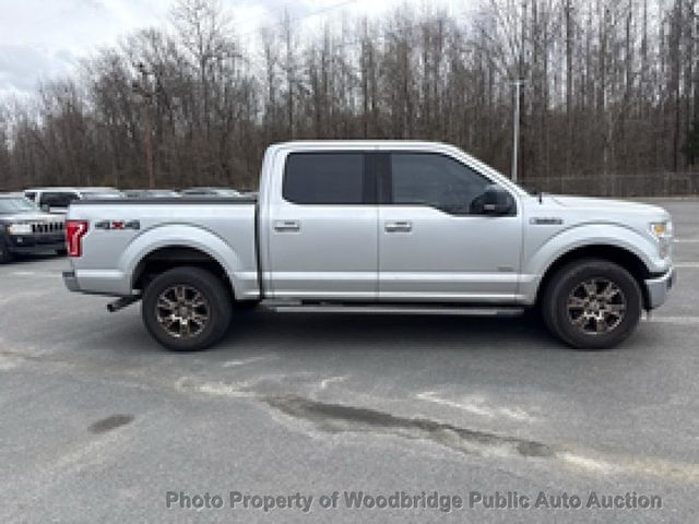 2015 Ford F-150 4WD SuperCrew 145" XLT - 22990915 - 28
