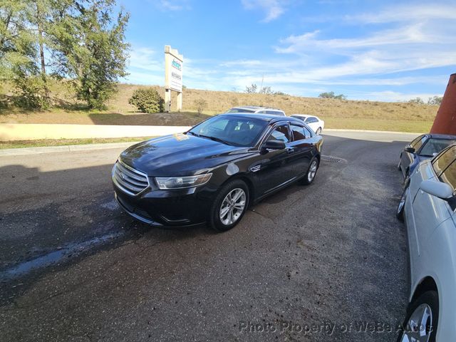 Used 2015 Ford Taurus SE with VIN 1FAHP2D81FG142924 for sale in Riverhead, NY