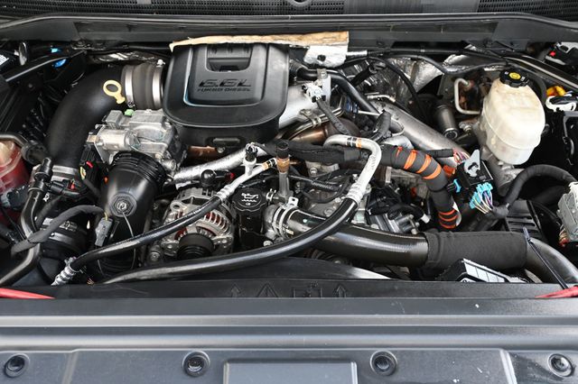 2015 GMC Sierra 2500HD 18" METHOD Wheels 35" AMP M/T Tires AMP Power Steps - 22847205 - 16