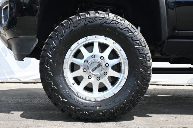 2015 GMC Sierra 2500HD 18" METHOD Wheels 35" AMP M/T Tires AMP Power Steps - 22847205 - 6