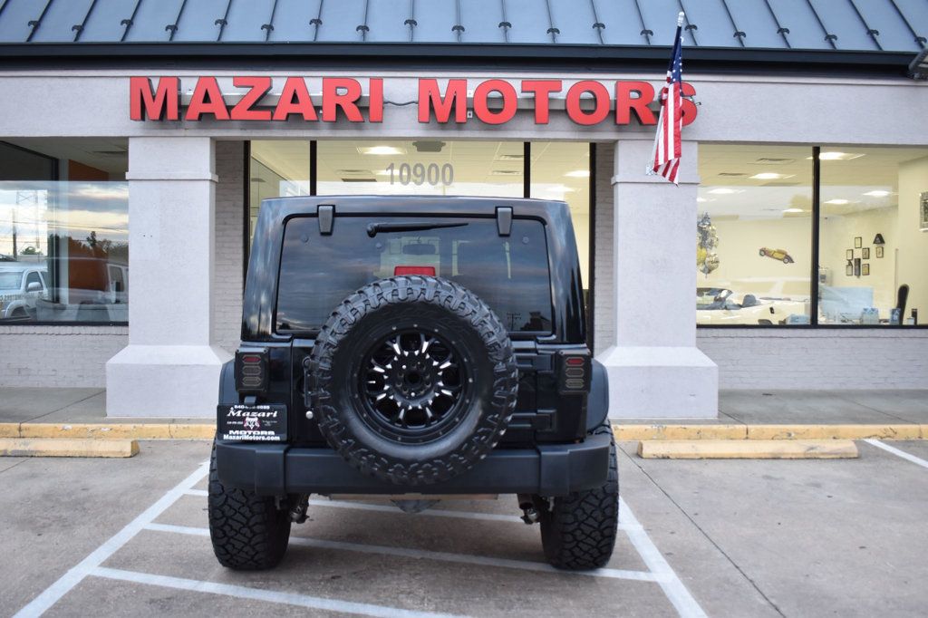 2015 Jeep Wrangler Unlimited 4WD 4dr Altitude - 23060560 - 9