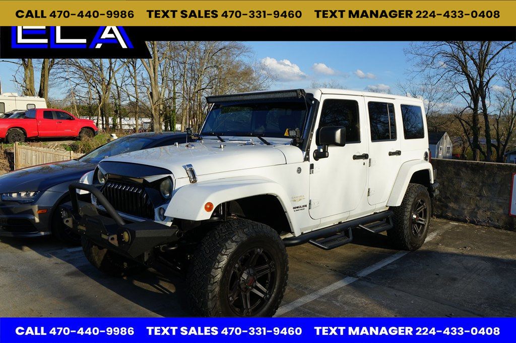 2015 Jeep Wrangler Unlimited 4WD 4dr Sahara - 22994409 - 0