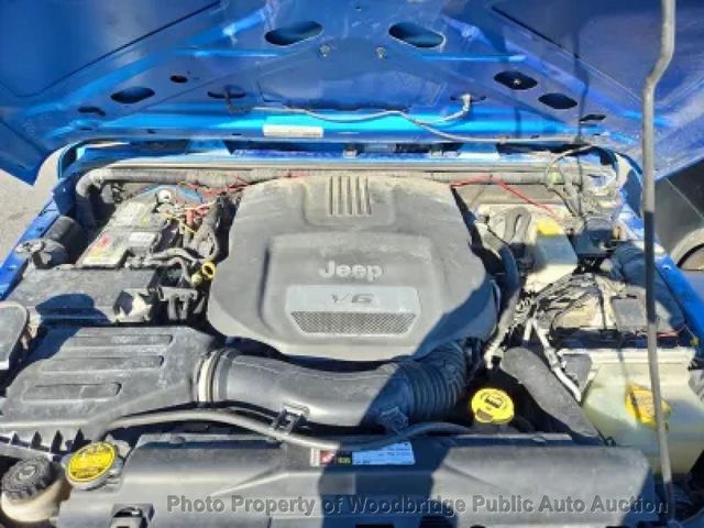 2015 Jeep Wrangler Unlimited 4WD 4dr Sport - 22991556 - 9