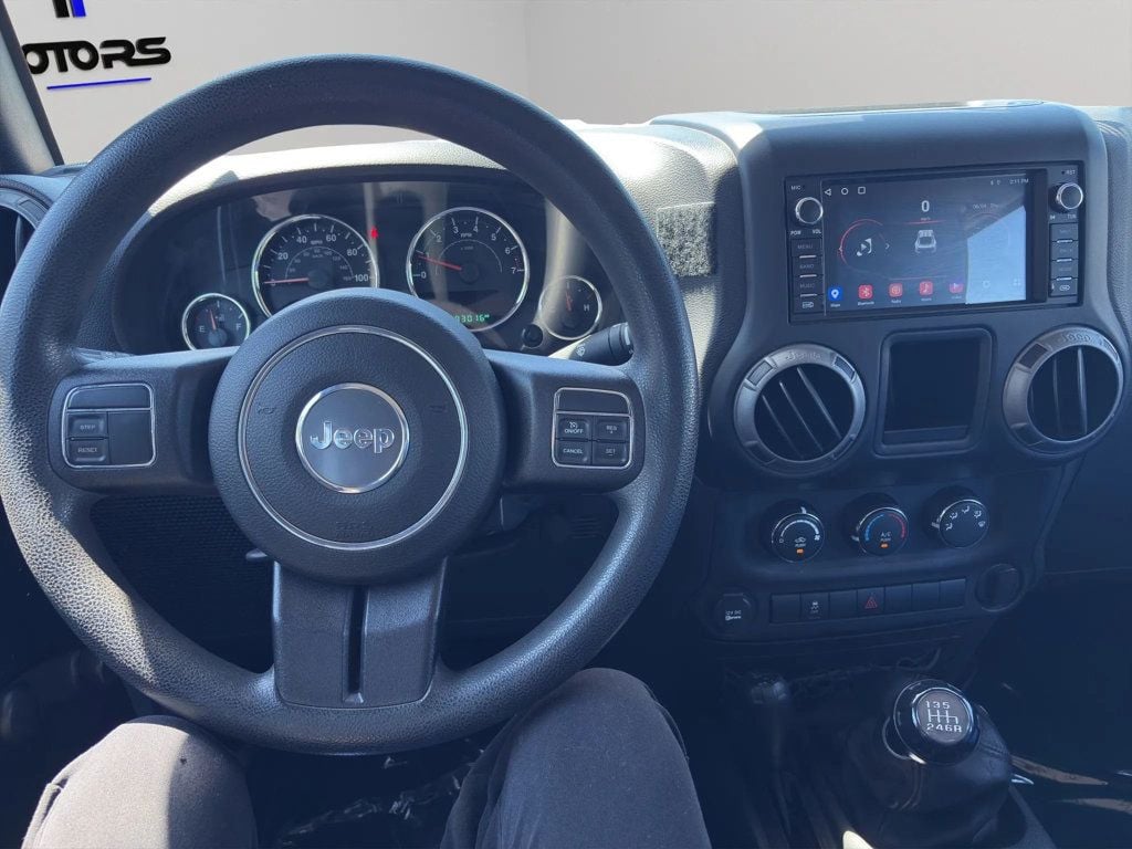 2015 Jeep Wrangler Unlimited 4WD 4dr Sport - 23031433 - 10