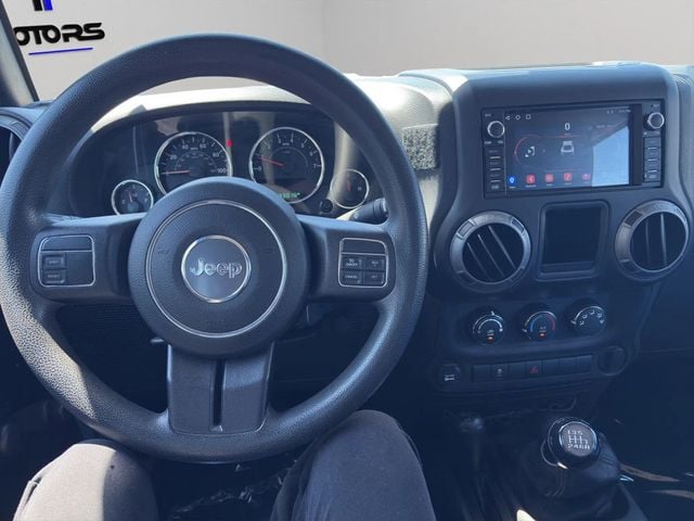 2015 Jeep Wrangler Unlimited 4WD 4dr Sport - 23031433 - 10