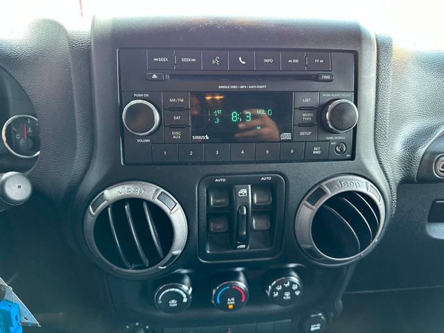 2015 Jeep Wrangler Unlimited 4WD 4dr Sport - 22884314 - 34