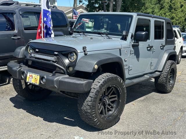 2015 Jeep Wrangler Unlimited 4WD 4dr Sport - 22477029 - 0