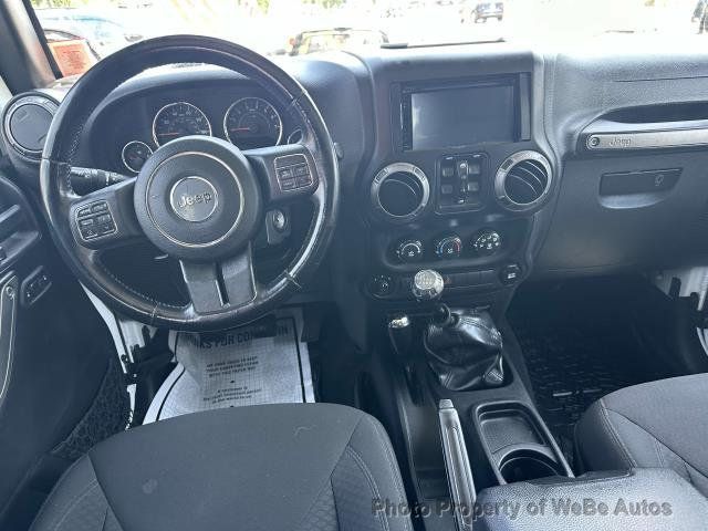2015 Jeep Wrangler Unlimited 4WD 4dr Sport - 22489773 - 9
