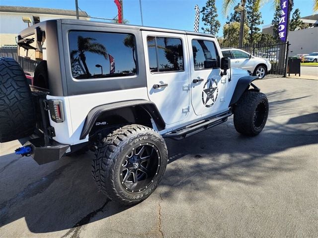 2015 Jeep Wrangler Unlimited Sport - 22654714 - 1