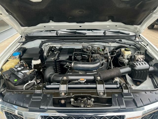 2015 Nissan Frontier 2WD King Cab I4 Automatic S - 22976920 - 8