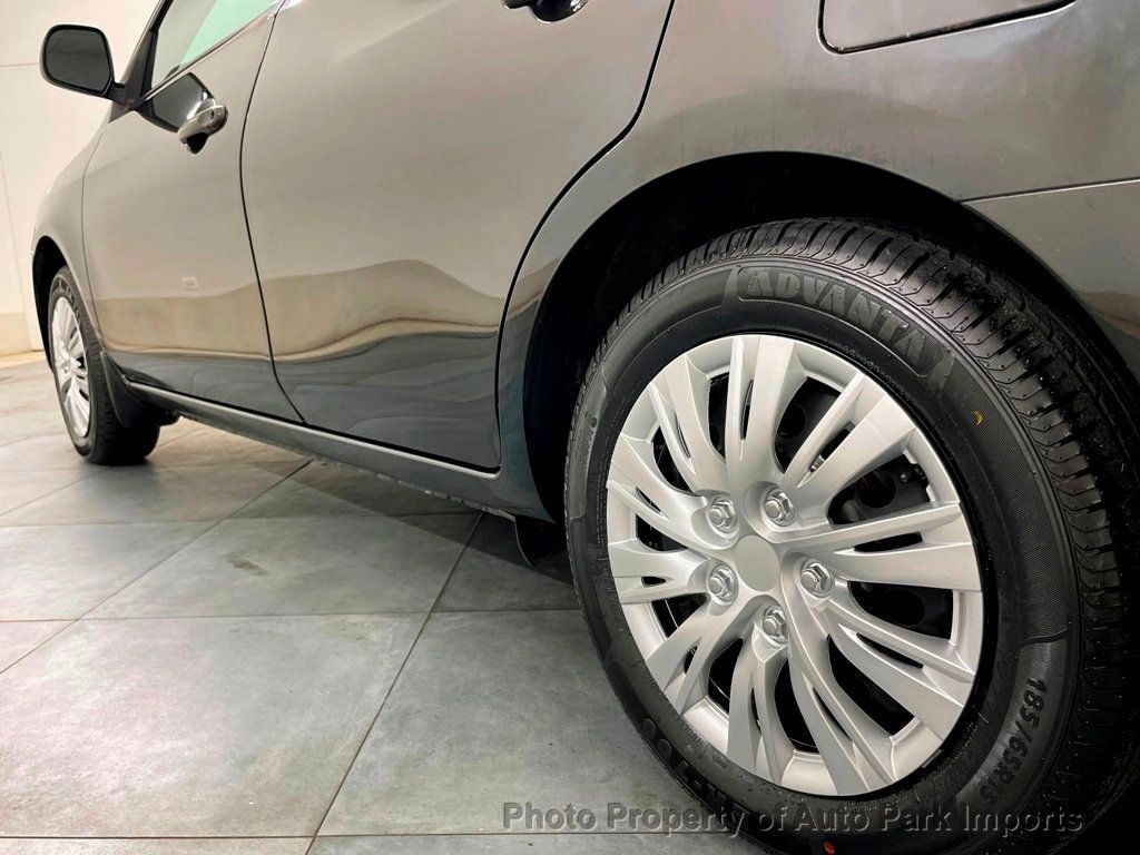 2015 Nissan Versa 4dr Sedan CVT 1.6 S Plus - 21665694 - 23