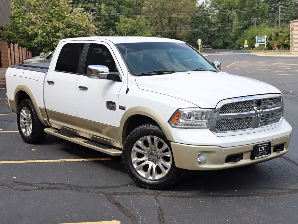 2015 Ram 1500 4WD Crew Cab 140.5" Laramie Longhorn - 22575887 - 9