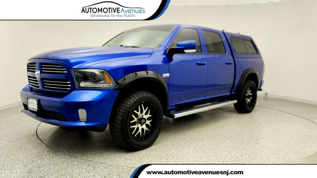2015 Ram 1500 4WD Crew Cab 140.5'' Sport w/ Upgraded 20'' Wheels, Cap & V8 - 23009480 | Video 1