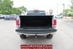 2015 Ram 1500 4WD Quad Cab 140.5" Big Horn - 22529993 - 13