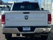 2015 Ram 1500 4WD Quad Cab 140.5" SLT - 22692396 - 26